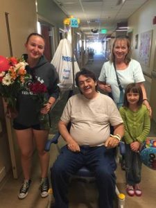 David Booker and family leaving the hospital! Looking good, Dave!