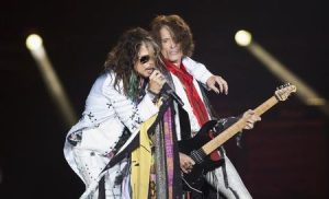 Vocalist Steven Tyler (L) and guitarist Joe Perry (R) of Aerosmith perform during their "Aerosmith: Let Rock Rule" tour at The Forum in Inglewood, California July 30, 2014. Reuters/ Mario Anzuoni