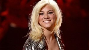 American Idol alum Jax showed her fighting spirit when she clawed her way to the No. 3 spot on season 14 of the singing competition, but the fight of her life came after the show. [Getty Images]