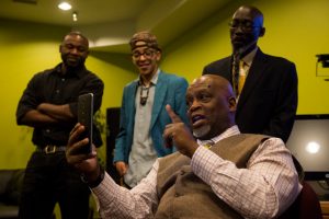 Leon Burroughs talks as he broadcasts on Facebook Live during a taping of Soul TV at Soul Center in Aurora, Colorado on November 21, 2016. Leon Burroughs, the new owner of the former Afrikmall property, is transitioning the space to be an entertainment and culture center called the Soul Center, where he also broadcasts his radio and TV shows GrooveRadio and SOUL TV.  (Photo by Seth McConnell/The Denver Post)